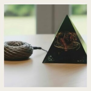 Black Shungite Orgonite Pyramid with clear quartz, copper coil and black salt handmade by Oma’s Sacred Tools