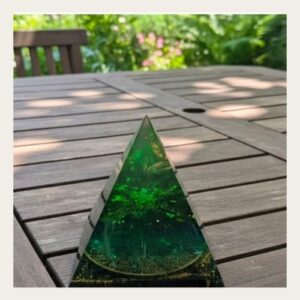 Emerald Green Shungite Orgonite Pyramid with clear quartz, copper and sacred elements for grounding and abundance